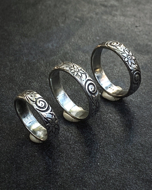 Imprinted Silver Ring Band